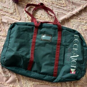 Dockatot traveling bag